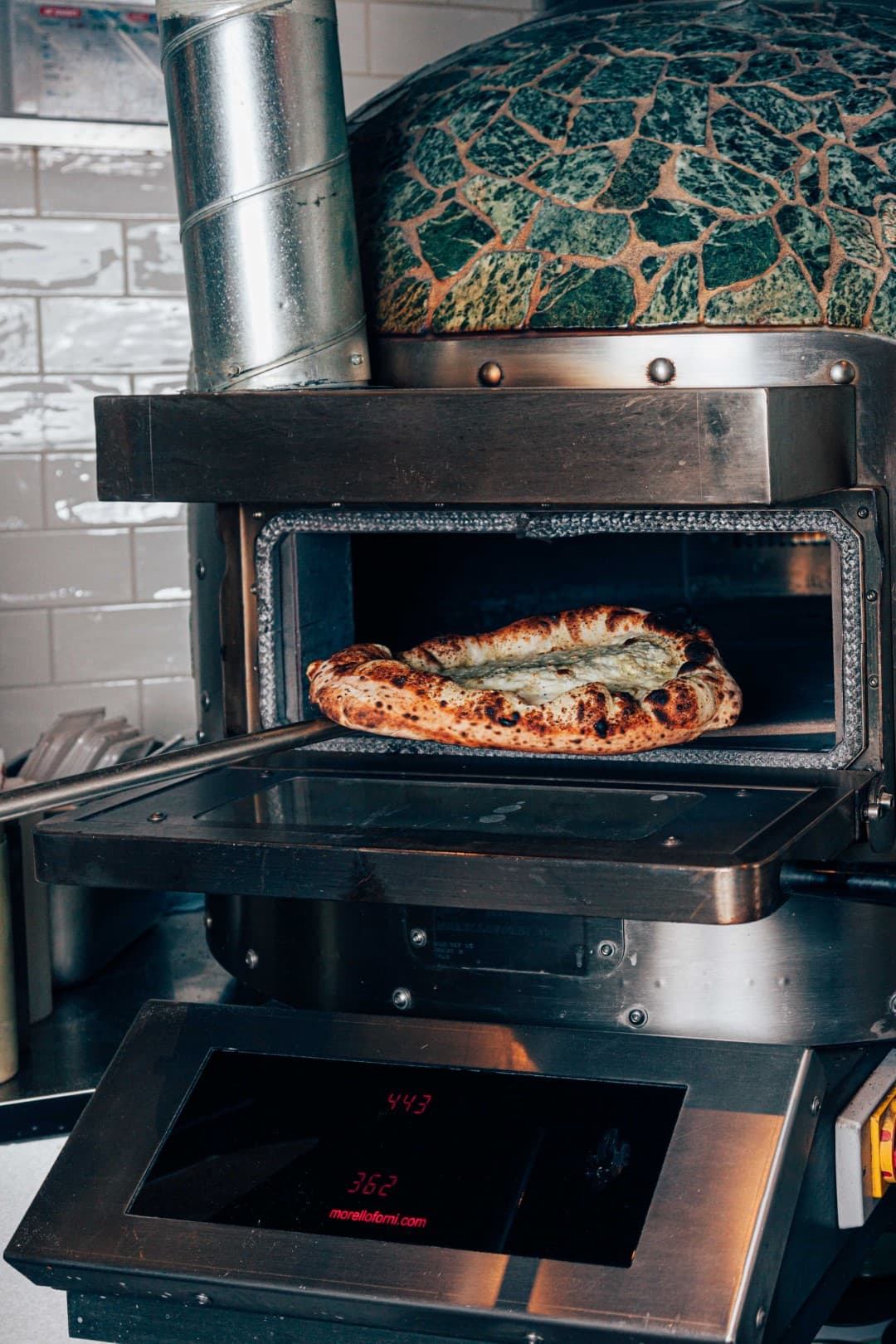 Pizza Mat’izza en cuisson dans le four